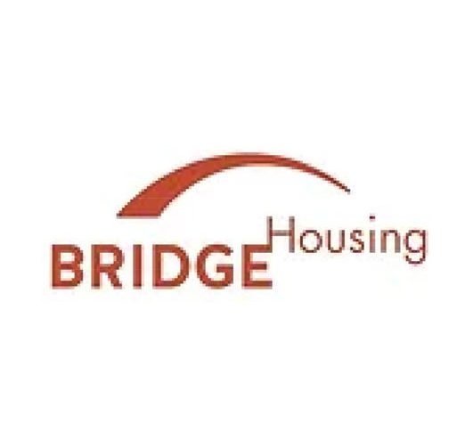 BRIDGE Housing logo with red arch.